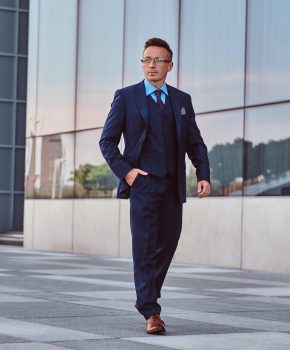 confident-businessman-dressed-in-an-elegant-suit-s-2021-08-28-09-03-39-utc