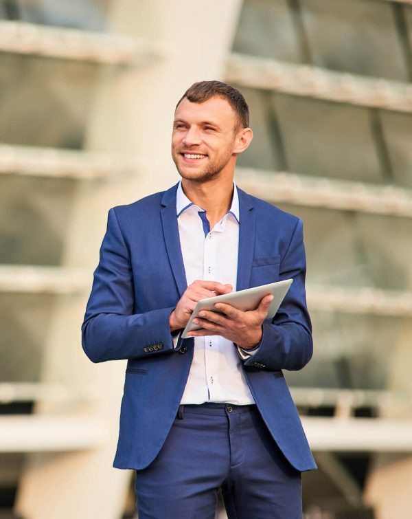 happy-businessman-with-a-tablet-2021-08-31-17-05-24-utc