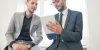 two-entrepreneurs-using-digital-tablet-2021-09-24-03-56-22-utc