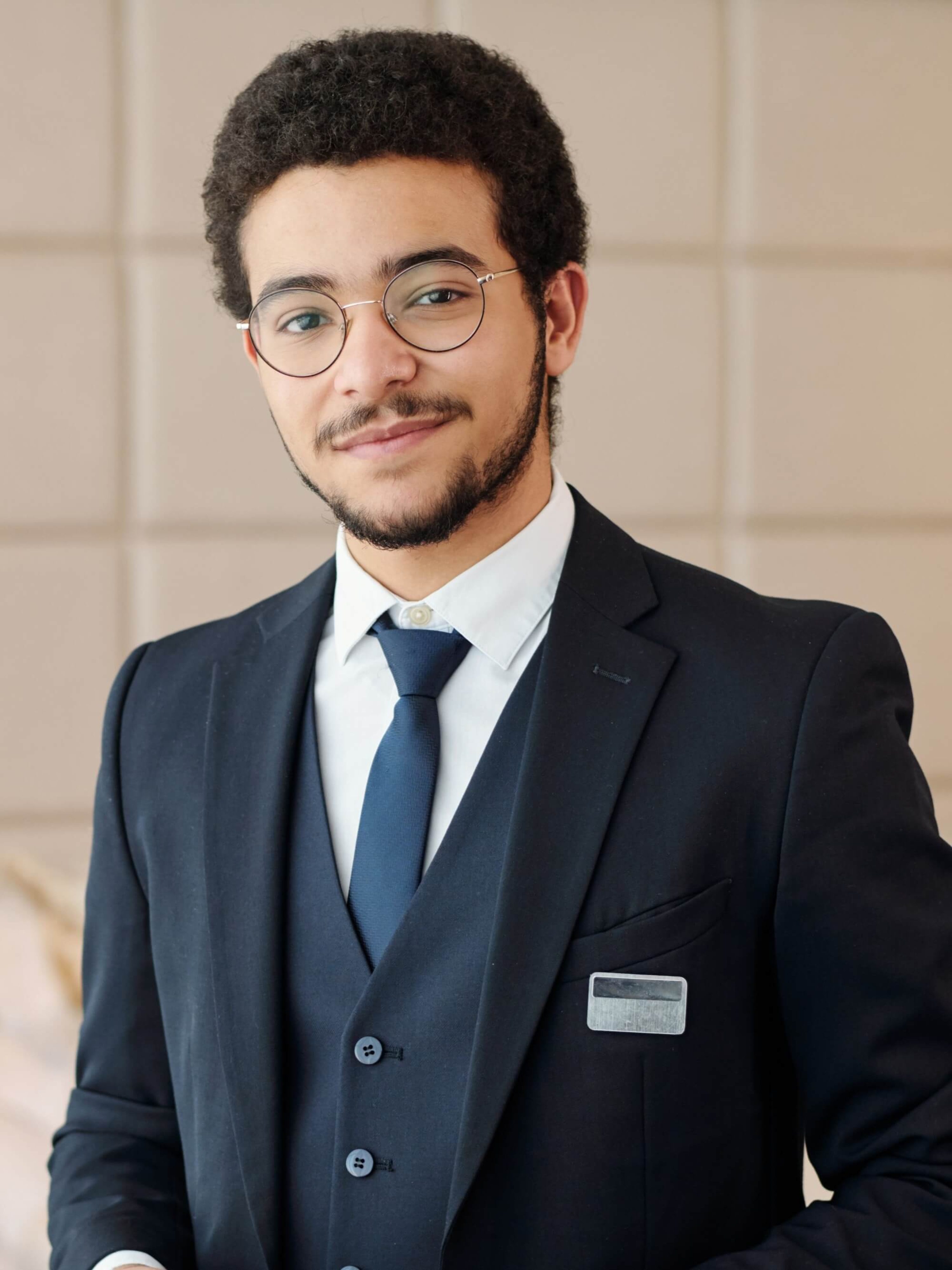 young-confident-head-manager-of-luxurious-hotel-lo-2025-03-14-22-10-53-utc