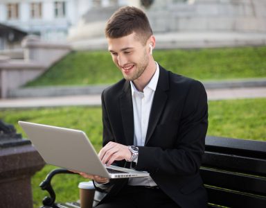 young-smiling-businessman-in-classic-black-jacket-2024-10-18-10-03-43-utc (Custom)